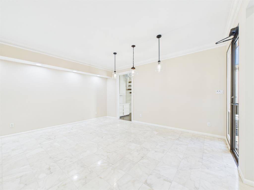 Dining area can easily hold a 12 seat dining table