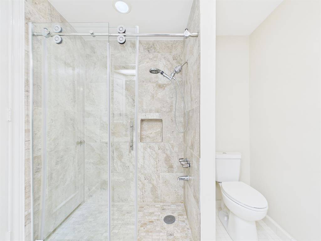 Tiled Standing Shower with Sliding Glass Door