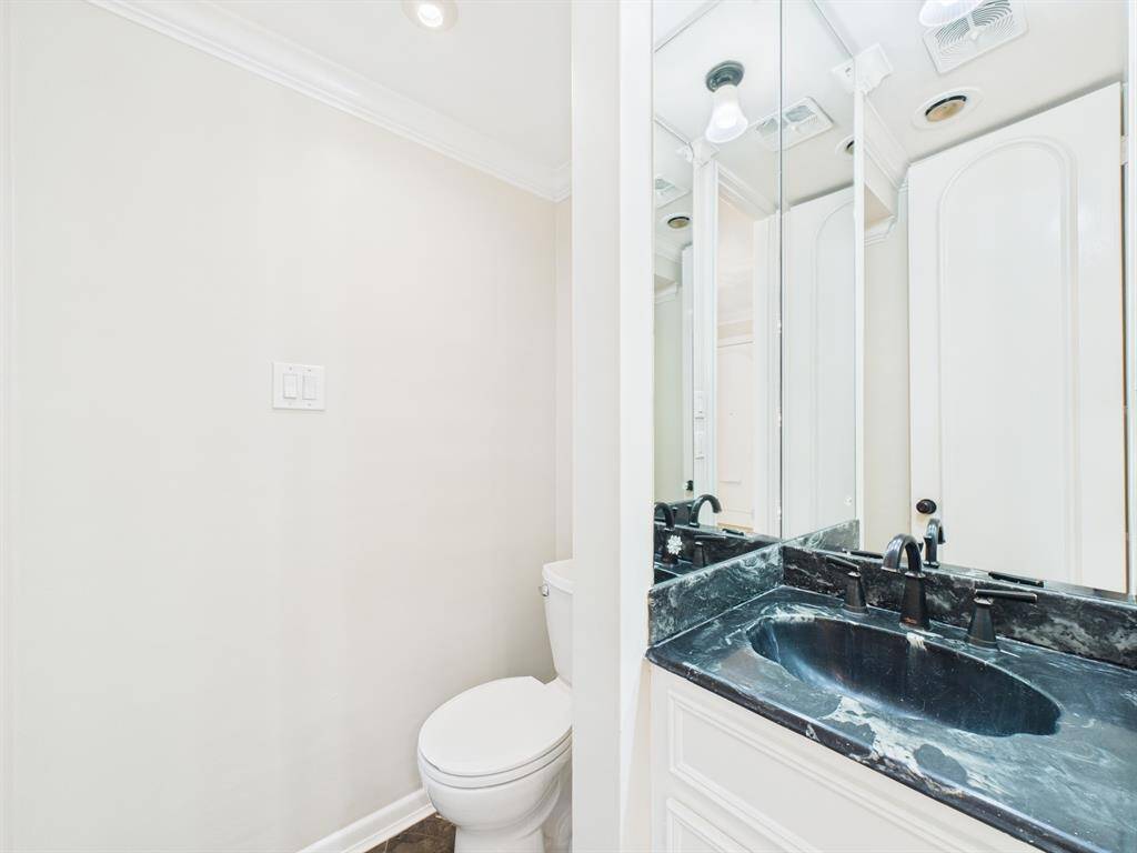 Powder Room off the Formal Entry