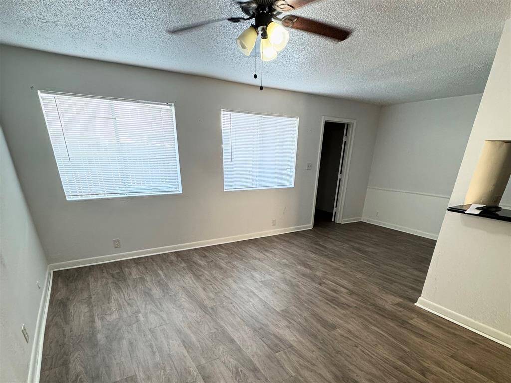 Living room open to kitchen and dining nook