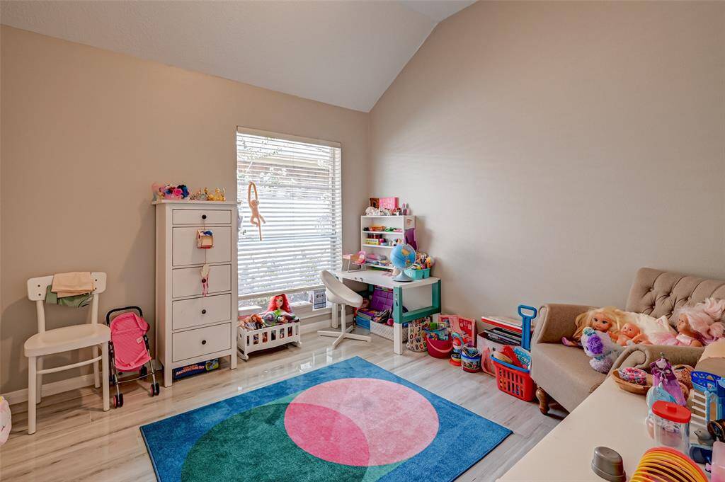 Secondary Bedroom Features Tile Floors.