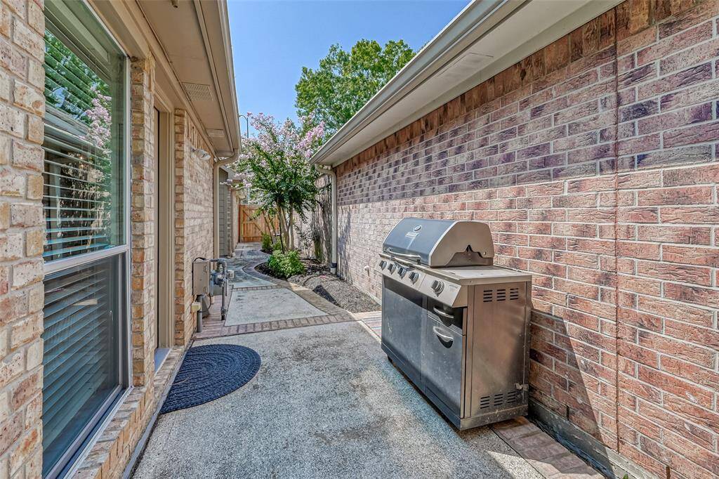 Side of home; Grill is not included.
