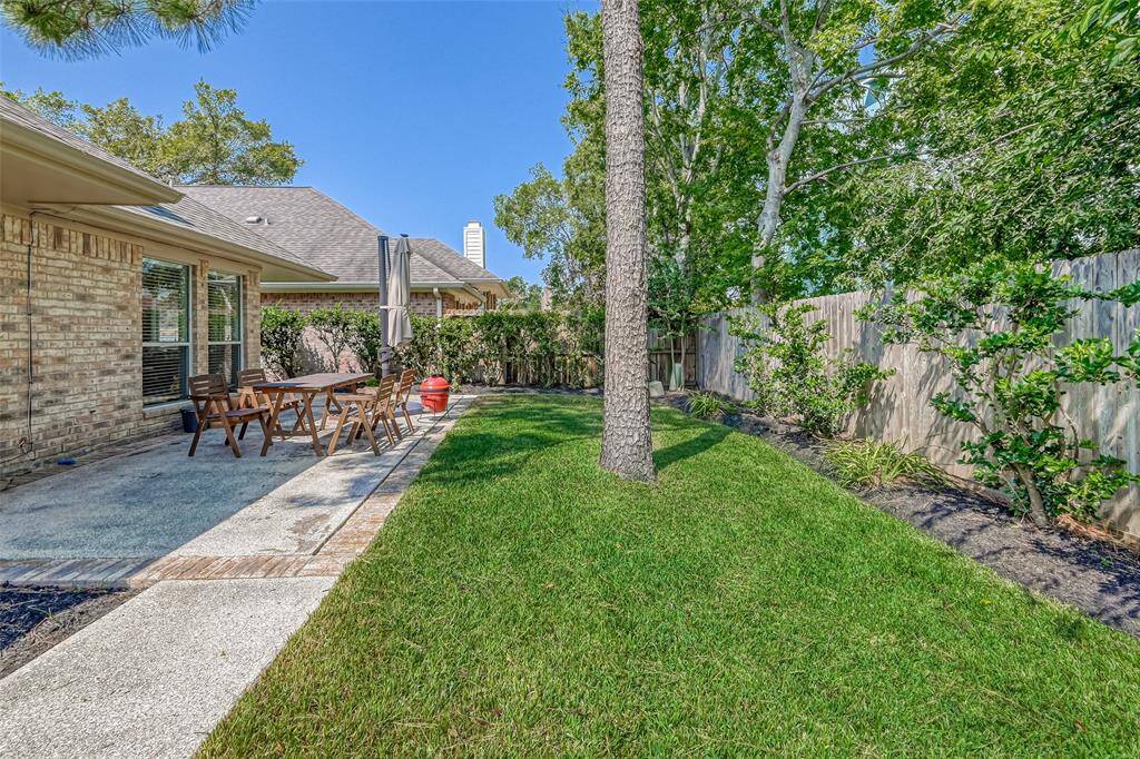 Large Patio with Green Space too!
