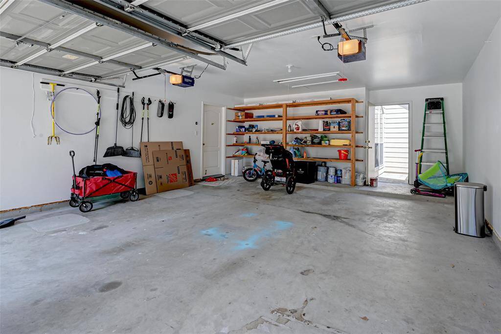 Garage has Storage Shelves.