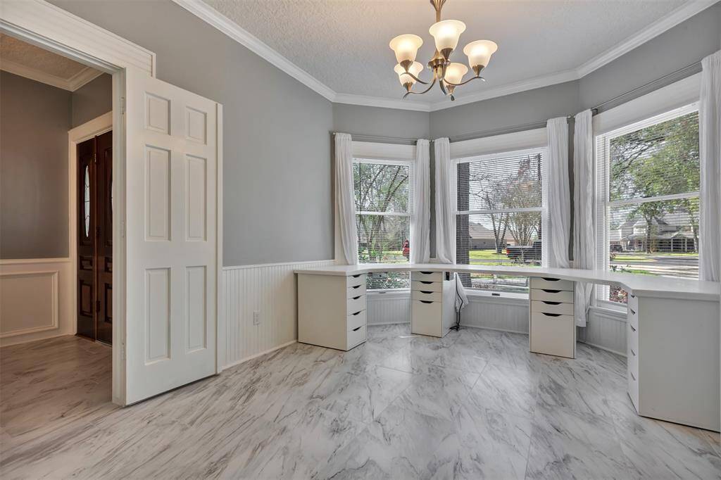The bay window allows plenty of light and charm to this space!