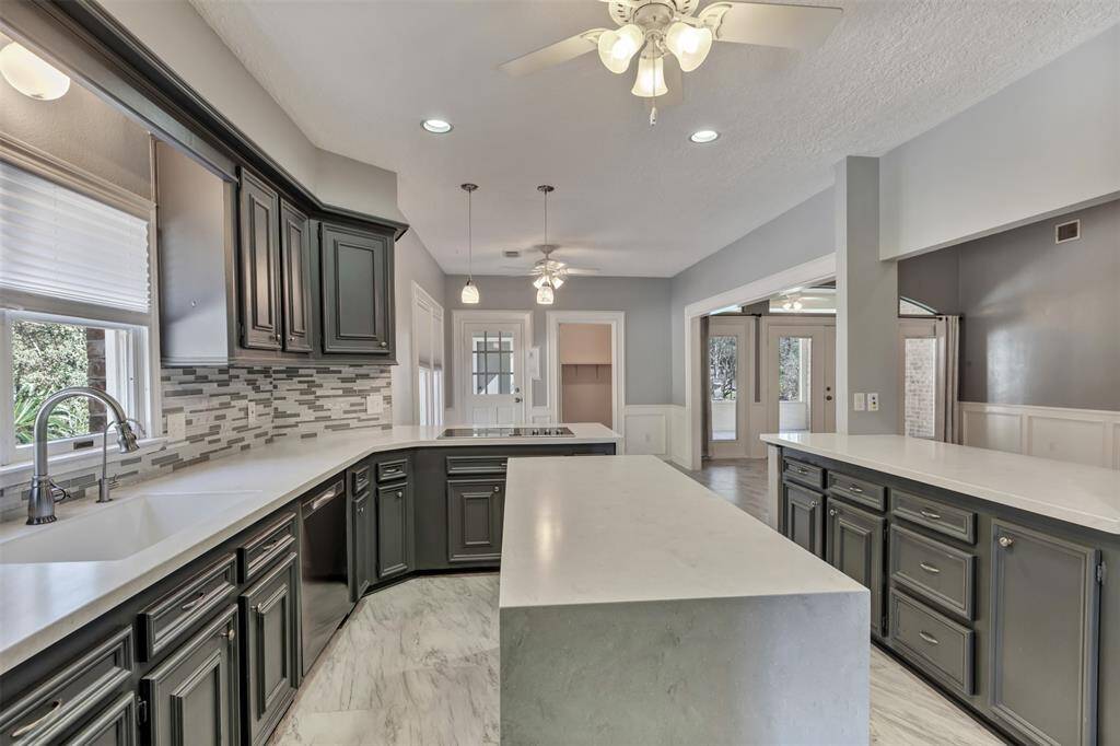 Crisp and clean lines, recent hardware, Frigidaire double ovens, dishwasher & more!