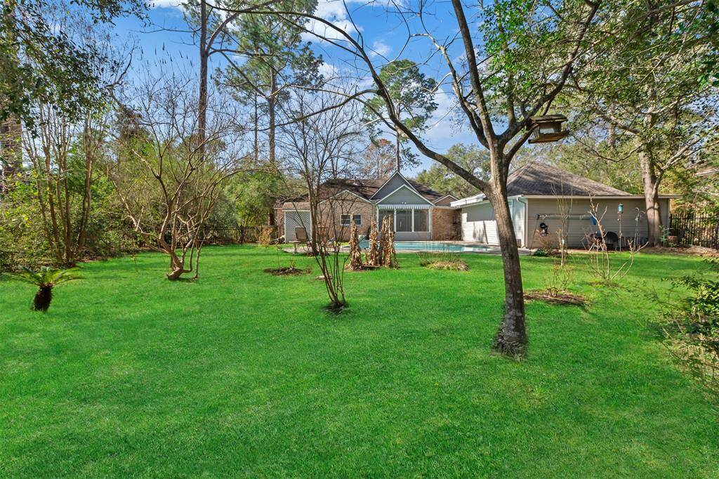 A rear view of the home to show the depth of the lot.  (This photo has been digitally enhanced)