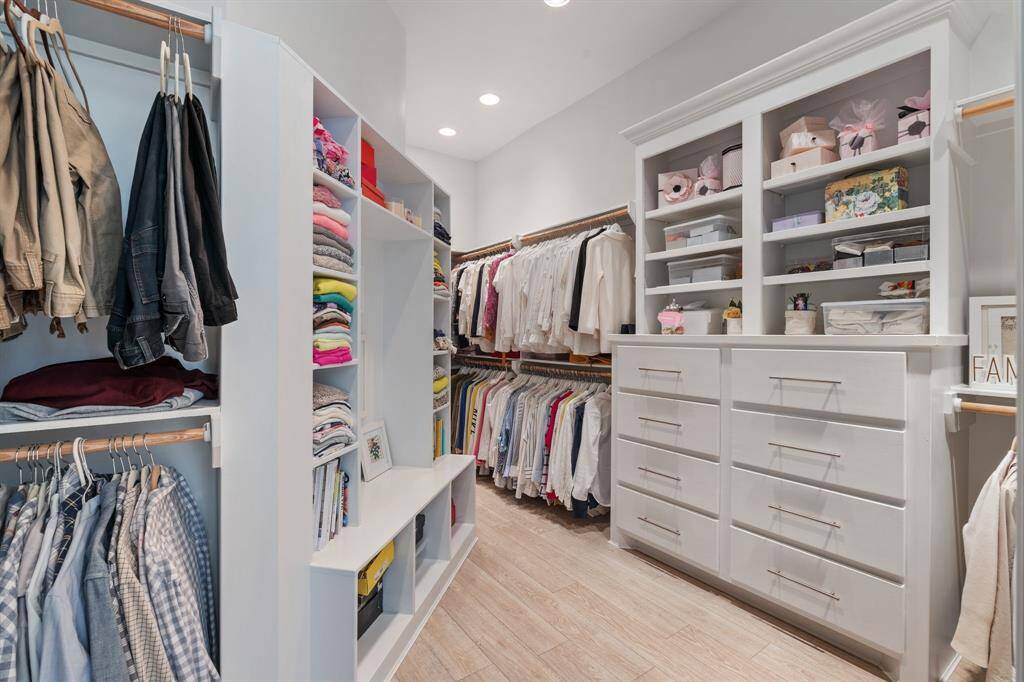 Experience luxury with a custom-designed closet, perfect for organizing your wardrobe.
