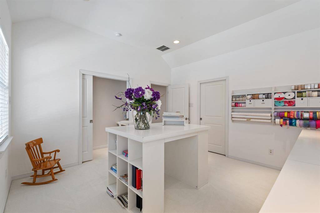 This spacious secondary bedroom has two walk in closets!