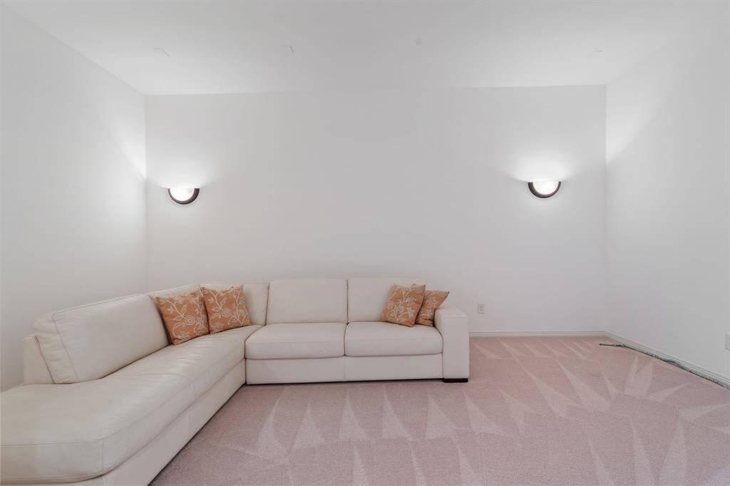 Transform your evenings in this inviting media room, perfect for entertainment.
