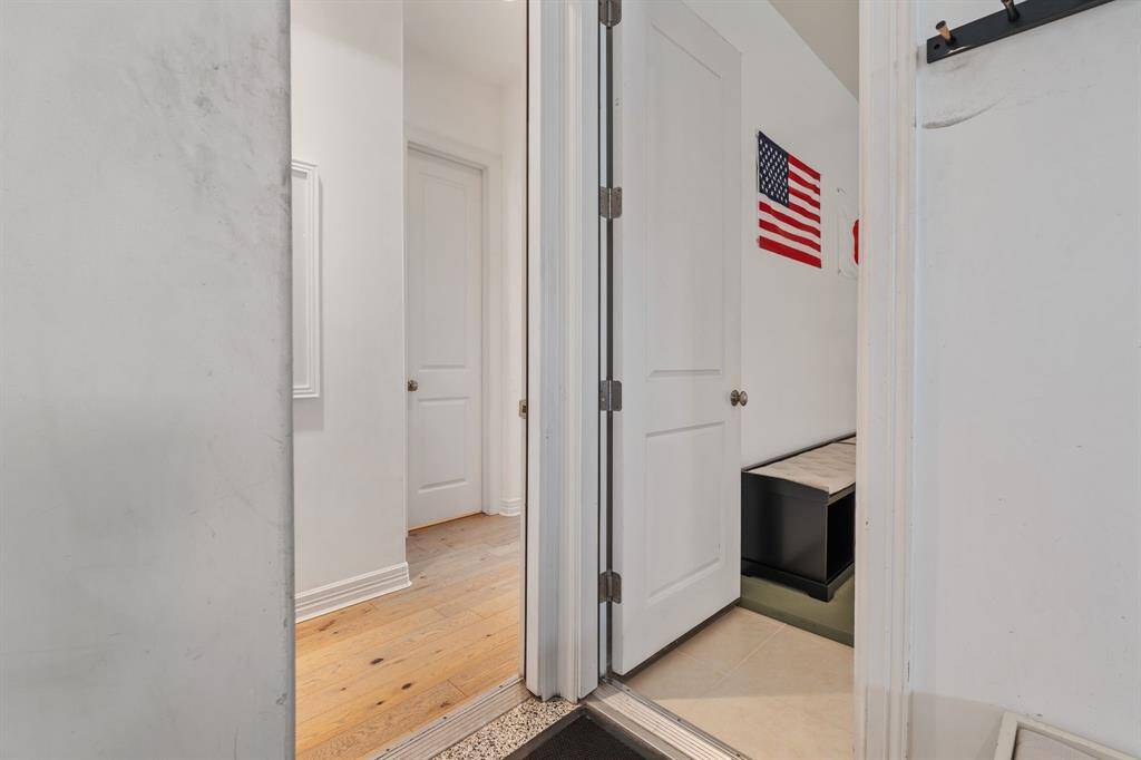 Off the garage are two entrances one entrance goes into the main house and the other enters into a spacious room currently being used as a Dojo.