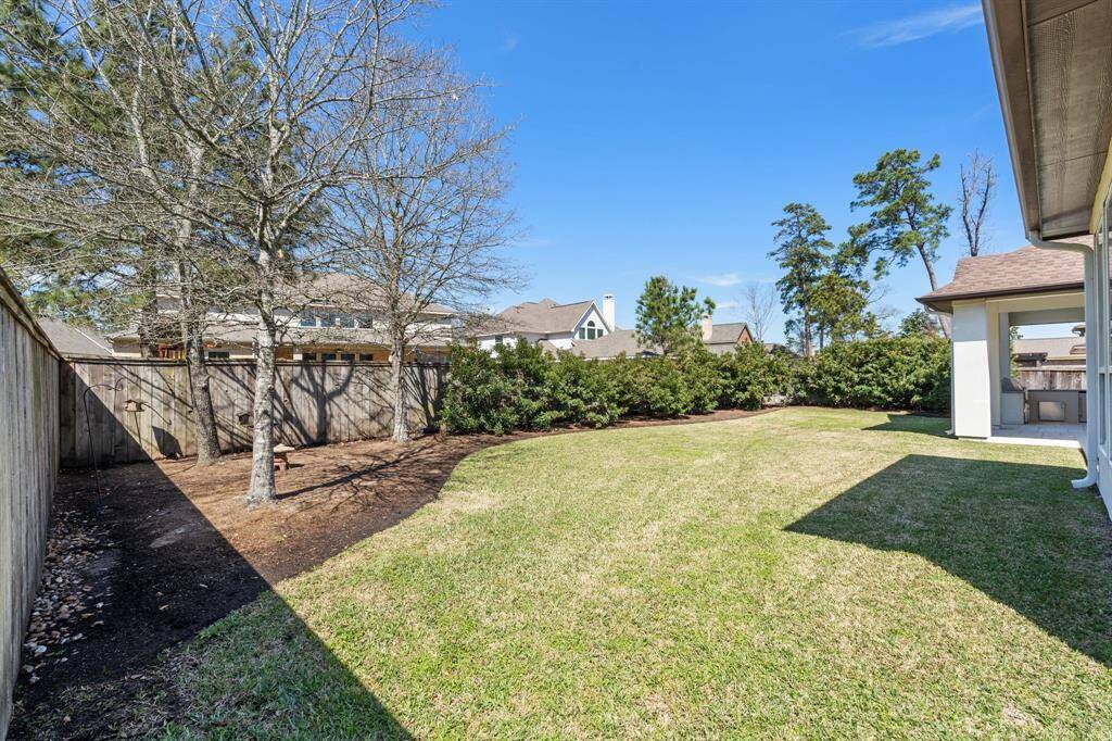 Enjoy enhanced privacy with a beautifully landscaped backyard oasis.