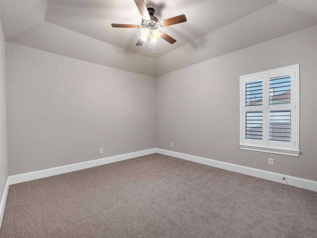 Primary Closet includes custom built-ins and plenty of storage.