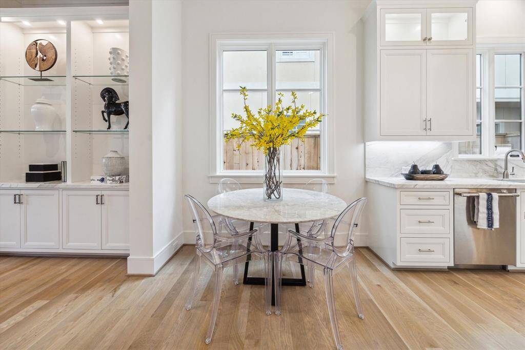 The sunny Breakfast Nook features a view of the side Garden.