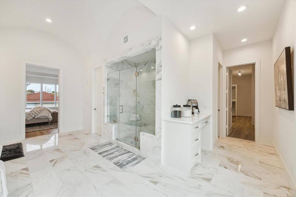 Within the Master Bath is a Vanity that could be used as a Dressing Table or a Morning Bar.