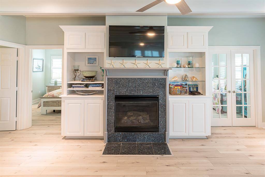 Fireplace with built-in bookshelves