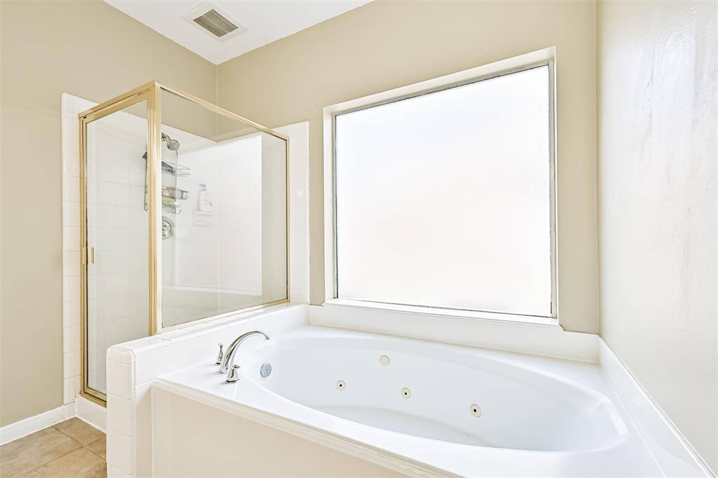Walk-in shower/bath.