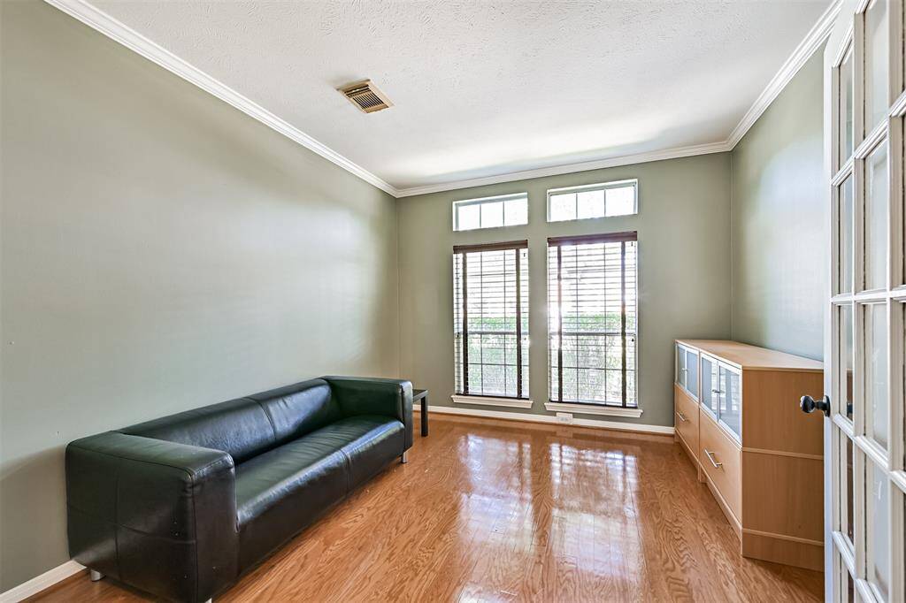 French doors provide privacy for this first floor office/study.