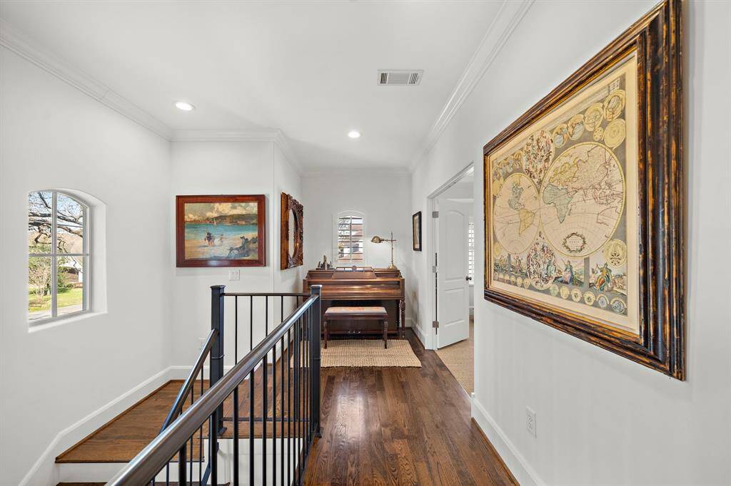 Impressive primary bath with dual vanities, spacious walk in shower, and luxurious soaking tub.  Two walk in closets!