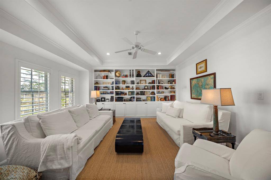 The second floor landing offers a perfect spot for a piano or desk.