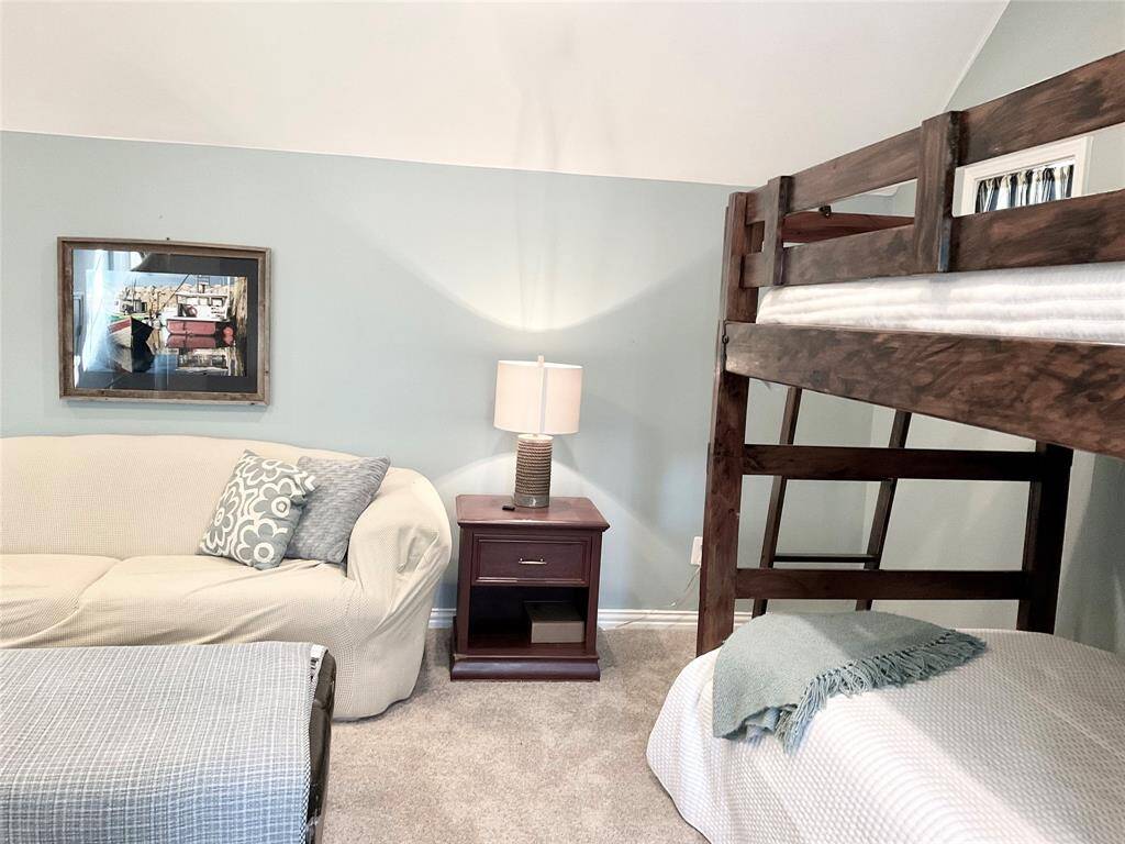 This cozy room is an inviting space, perfect for relaxation or accommodating guests.  Everyday feels like a vacation!