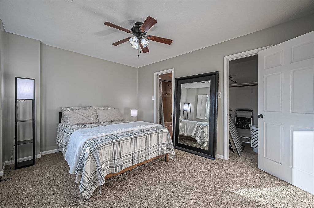 Secondary bedroom with connecting shared bathroom.