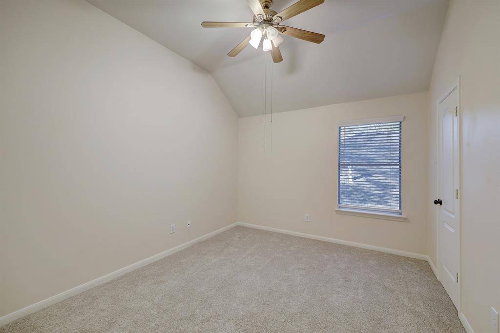Third bedroom has fresh carpet and vaulted ceiling