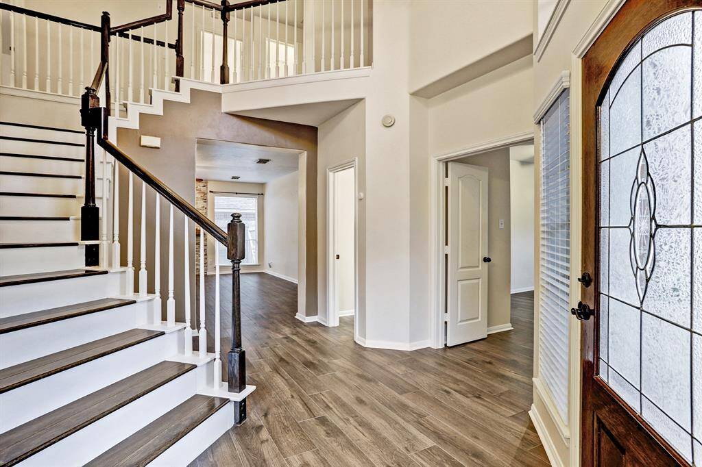 Wood look tile floors on the entire first floor