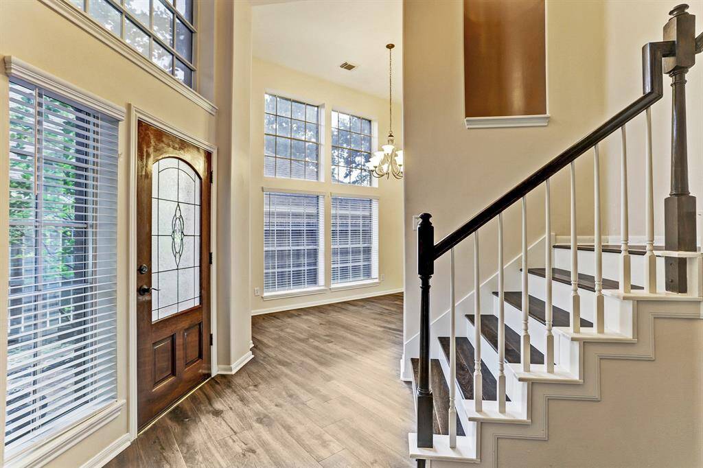 Light and bright two story entryway