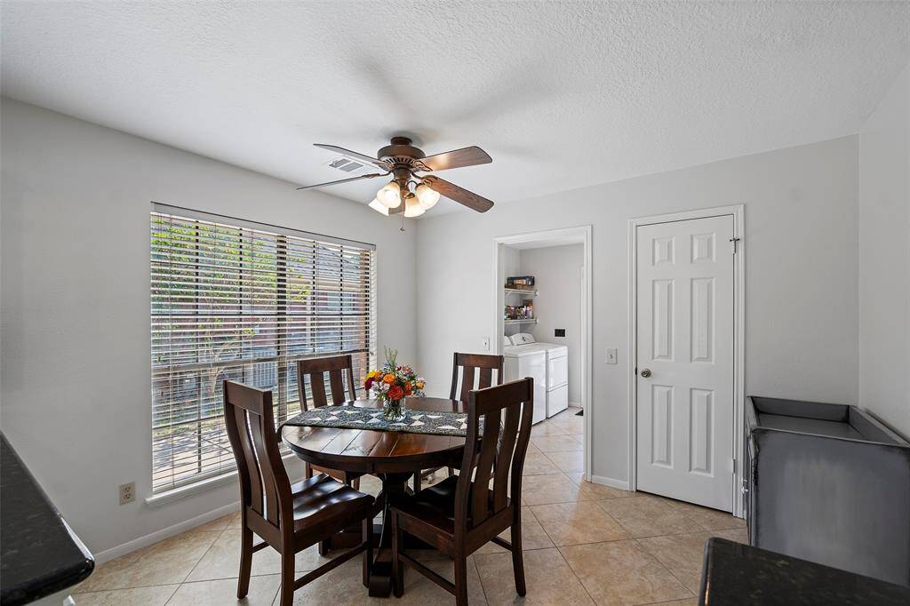 A spacious breakfast room is the perfect place for quiet mornings, enjoying a cup of coffee!