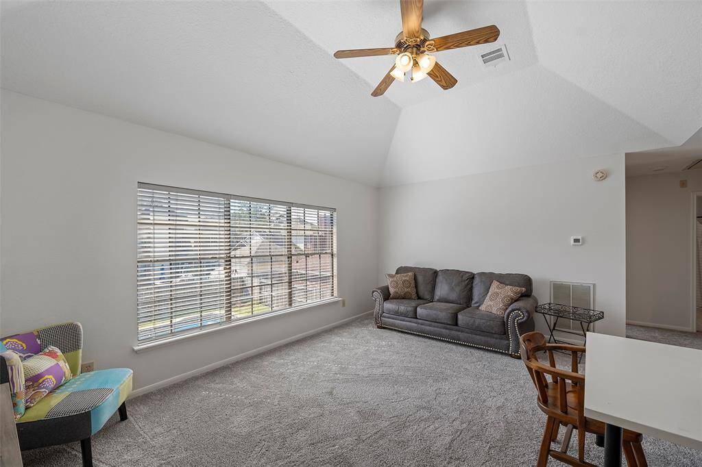 Do you have designs of a pool table or shuffleboard?  Or maybe a yoga studio, or gaming area!  This space is large and neutral and ready for any designs you may have!