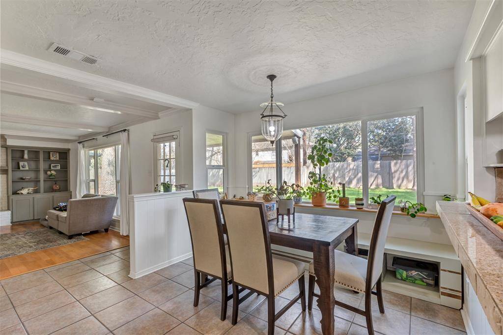 Windows span the back of the home allowing the private backyard to become a beautiful feature