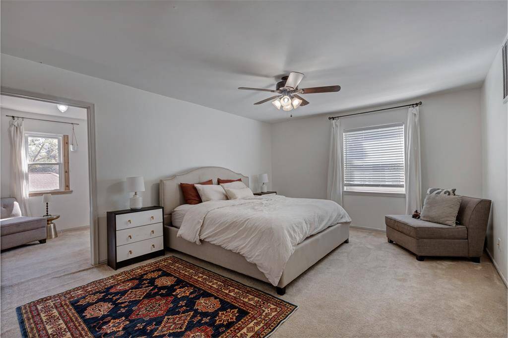 Primary bedroom is upstairs & is huge ... the private sitting room is just beyond the wall