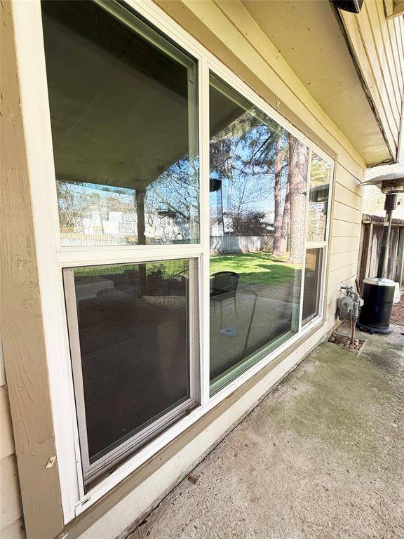 Huge yard with covered patio, plenty of room for a pool