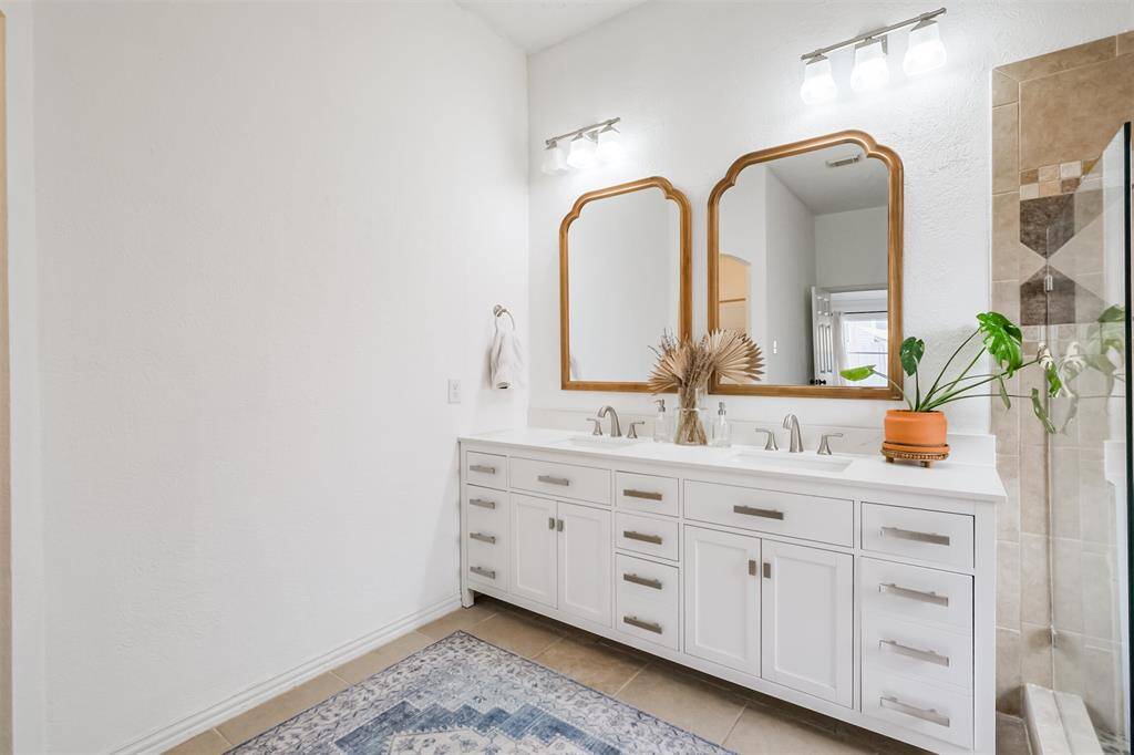 Recent cabinets, mirrors, and light fixtures.