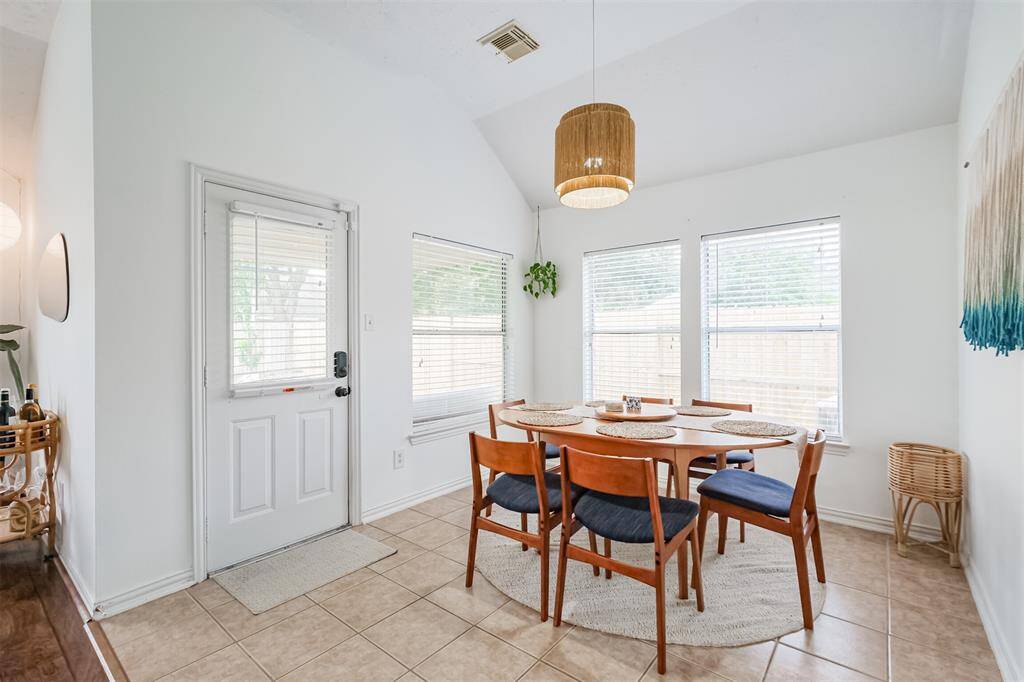 Surrounded by windows and updated light fixture.