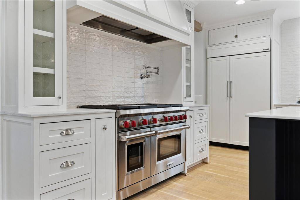 Wolfe 48 inch range with  wall mounted pot filler.