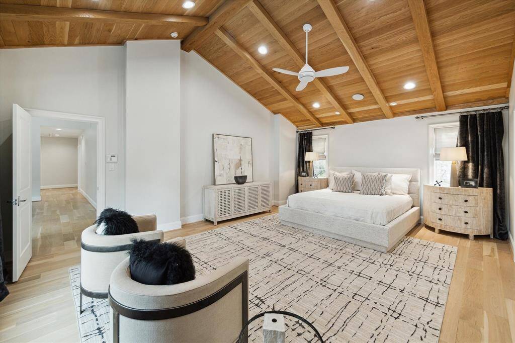 Primary Bedroom with wooden Cathedral Ceiling.