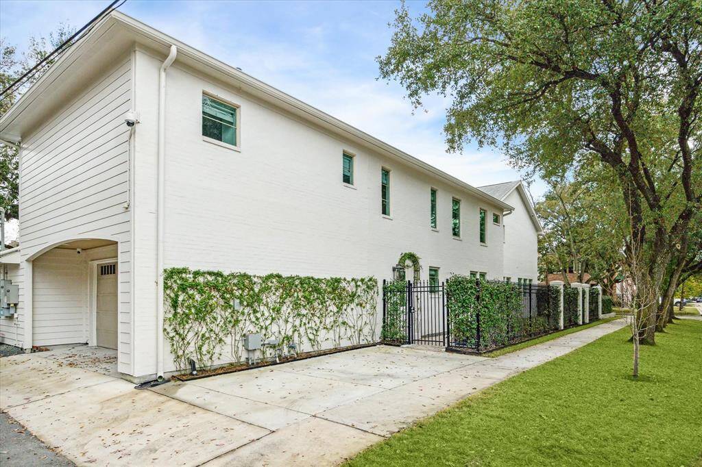Alley access to garage and additional parking.