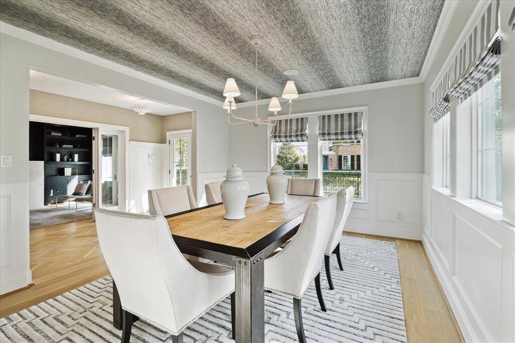 Formal Dining with wallpaper ceilings.