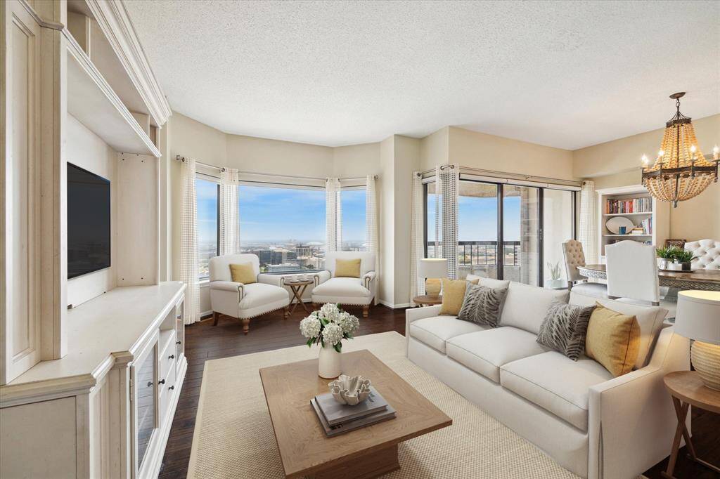 Welcome to Unit 3203 located on the 32nd floor of the Spires high rise condominiums located in the Medical Center! Experience birds eye views from your Living Room on the 32nd floor of the luxurious Spires high rise condominiums. (Virtually staged)