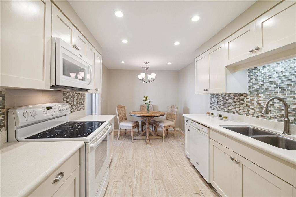The Kitchen offers plenty of storage and countertop space for meal preparation.