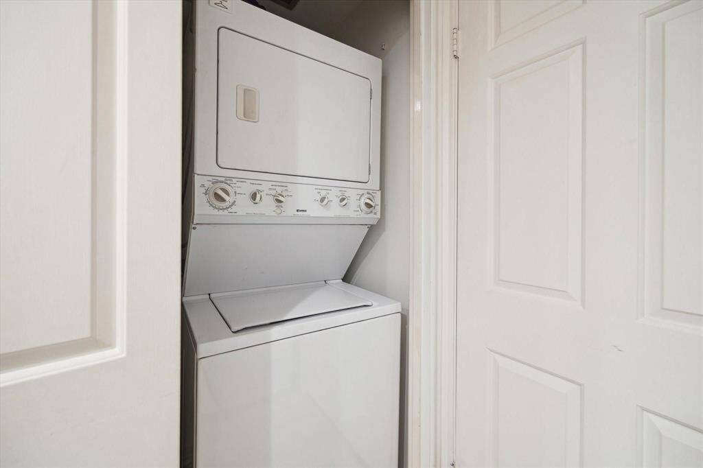 Unit offers a convenient stacking washer/dryer, as well as a tankless water heater.