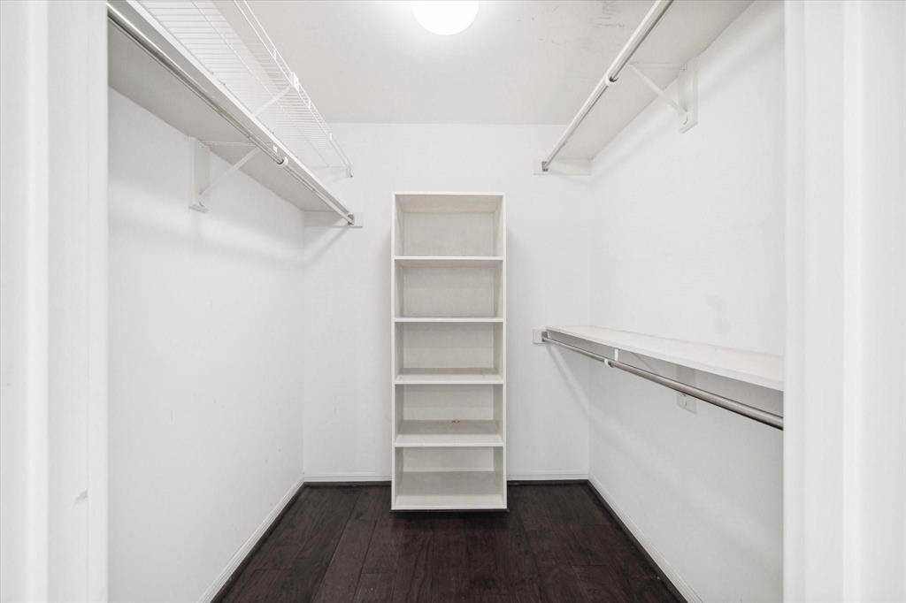 Primary Suite has an oversized walk-in closet with lots of hang space and shelving!
