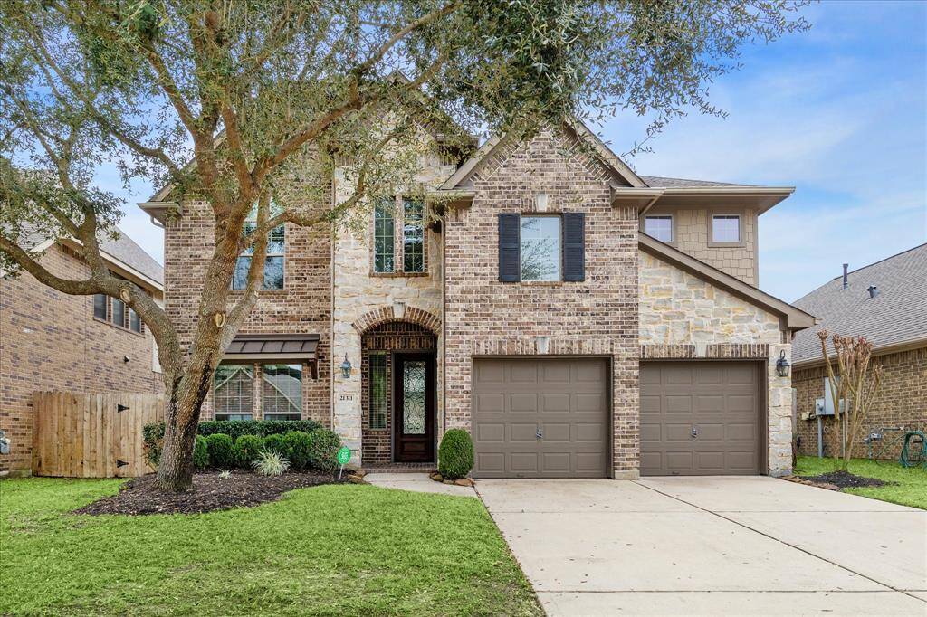 Gorgeous a two-story brick and stone home with 4 Bedrooms, 3.5 bath, featuring a two-car garage, well-maintained front lawn with a mature tree on a cul de sac street in highly sought after Kings Mill.