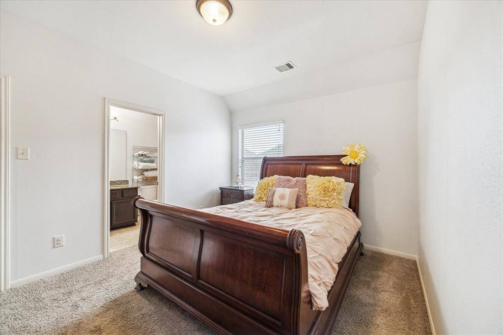 Secondary bedroom with ensuite bathroom.