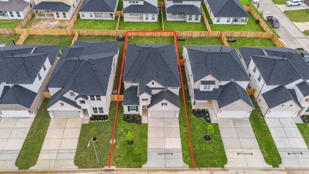 This home sits on a large lot with ample space in front and the back, lush landscaping and a well-maintained yard.