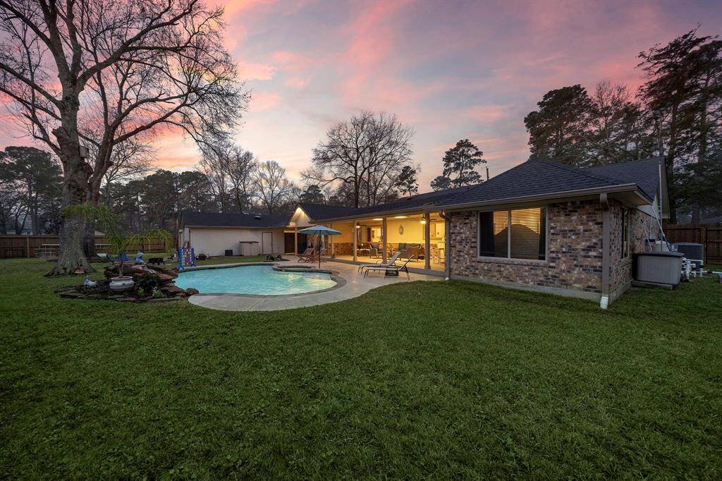 Whether lounging poolside, gathering around the outdoor dining area, or relaxing in the spa, this outdoor space is designed for making memories.