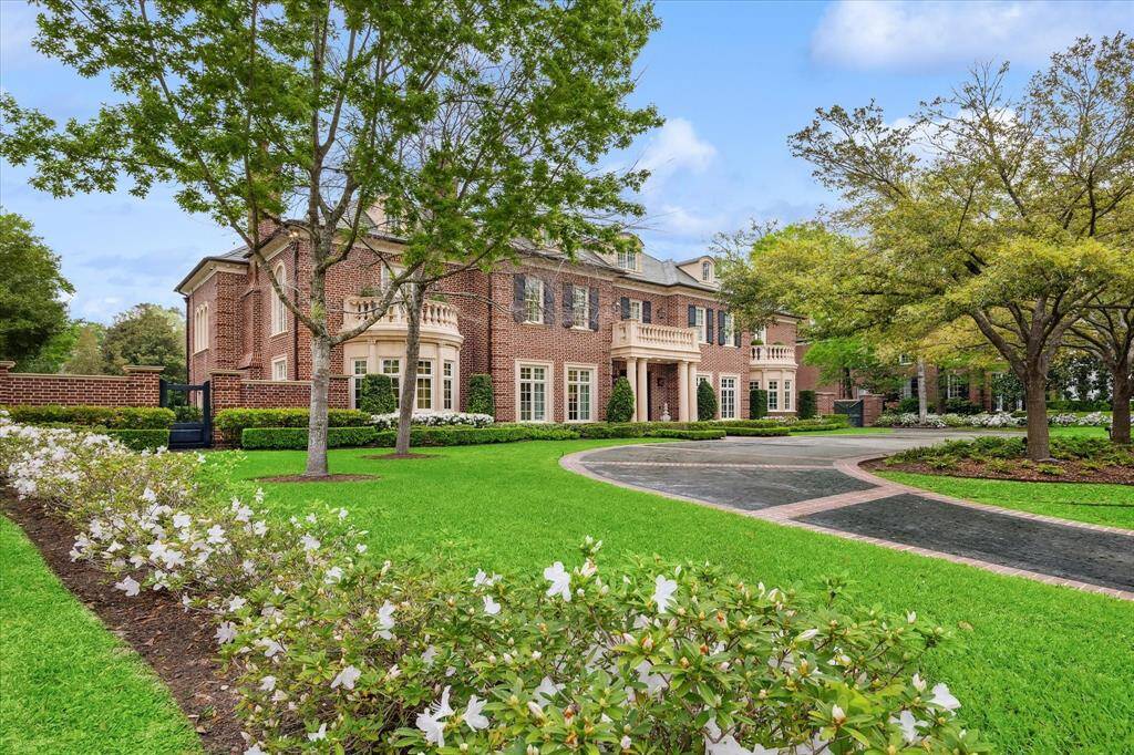 Tucked away behind the privately manned gates of prestigious Farnham Park subdivision, this custom Georgian home is a site to behold, both inside and out!