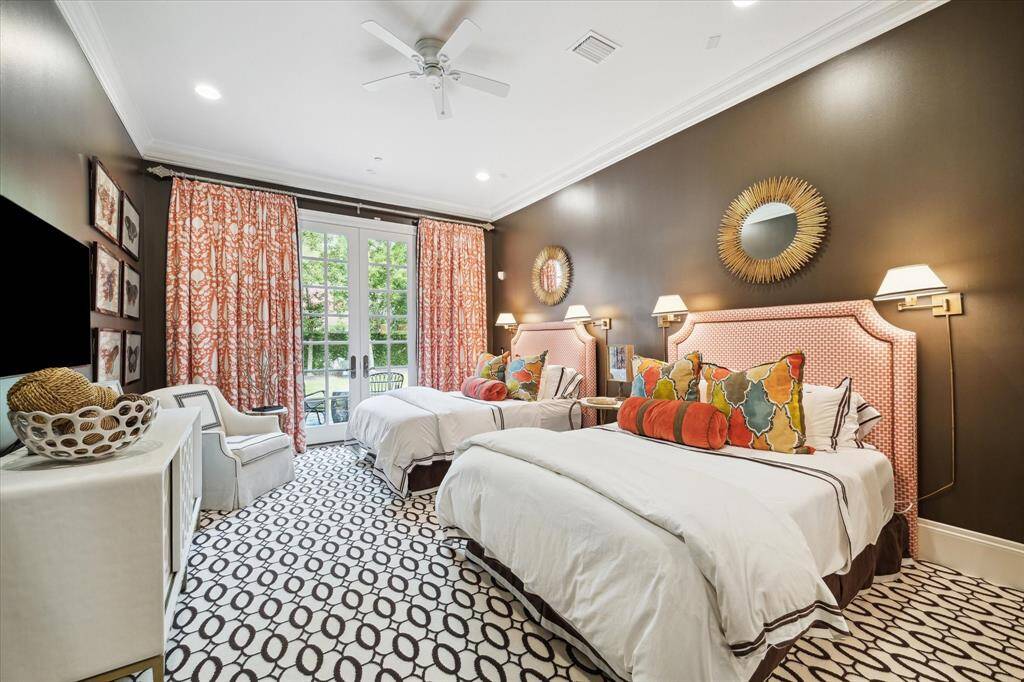 Private guest retreat off of the kitchen and breakfast room has its own private porch with views of the koi pond and green space.